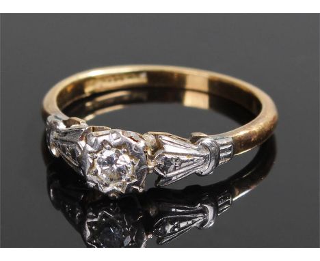 18 carat gold diamond ring, a diamond to the flower head with leaf shoulders, ring size P 1/2