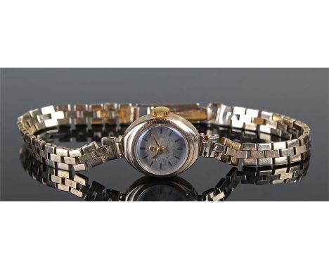 Election 9 carat gold ladies wristwatch, the dial with the lower case e signed with baton hours, 9 carat gold bracelet strap,