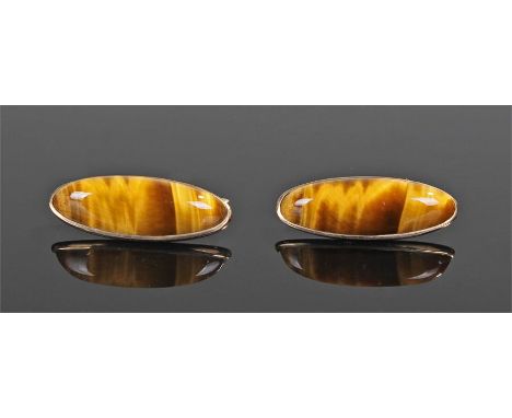 Pair of 9 carat gold and tiger's eye set cufflinks with long cabochon tigers eyes on 9 carat gold mount, 27mm long