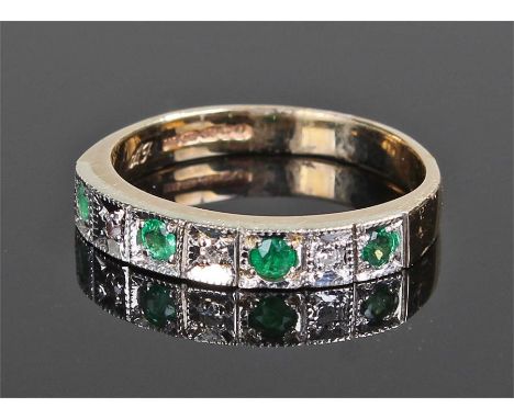 9 carat gold emerald and diamond ring, set with four round cut emeralds and three round cut diamonds, ring size J