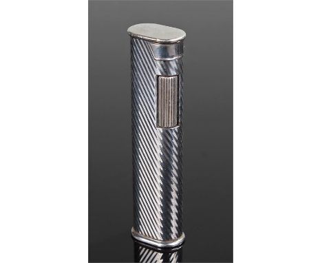 Dunhill silver plated lighter, the slender lighter with ribbed body and hinged top, 7.5cm high