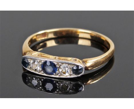 18 carat gold sapphire and diamond ring, set with three sapphires and two diamonds, ring size N