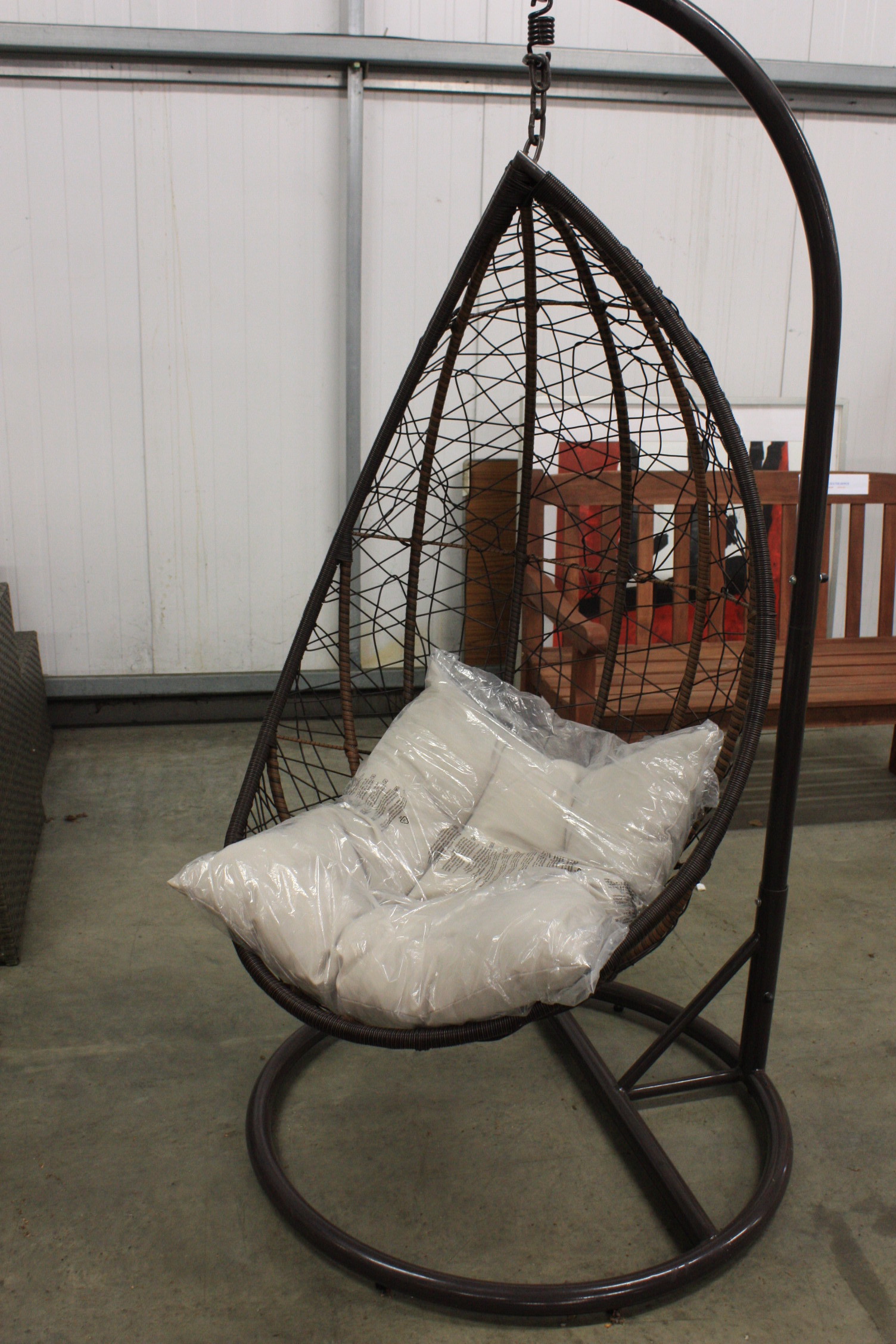 No Reserve teardrop swing chair on stand ex display