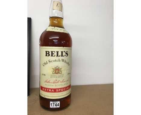 A 4,5 litre bottle of Bells scotch whisky.