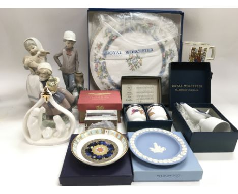 A collection of mainly boxed ceramics and glass comprising Lladro, Nao, Wedgwood etc.