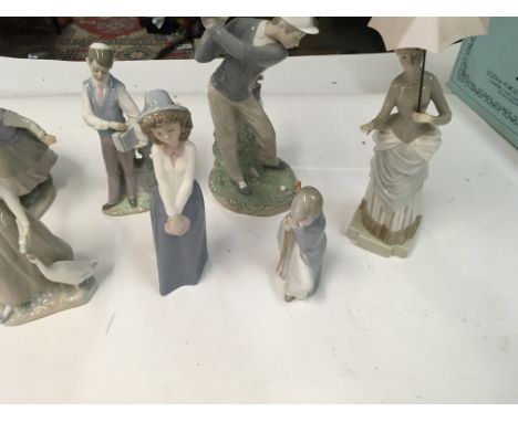 10 x Lladro figures including Nao woman feeding duck.