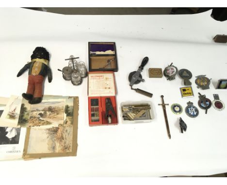 Collection of various oddments including vintage motor vehicle badges