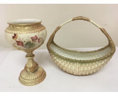 A Royal Worcester porcelain basket Hight 20cm and a Royal Worcester vase decorated with flowers and foliage with applied gilt