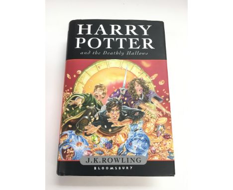 A first edition hardback book of 'Harry Potter And The Deathly Hallows' by JK Rowling.