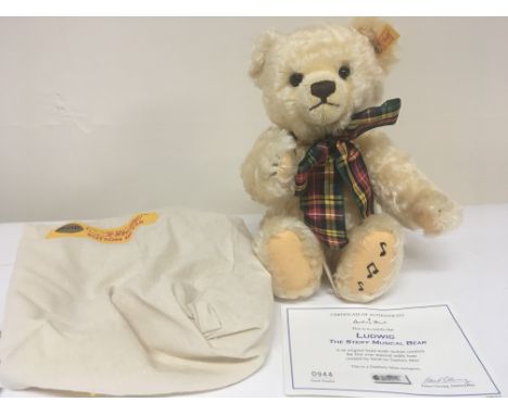 A Steiff Ludwig Bear with certificate of authenticity number 944 and dust bag in excellent condition.