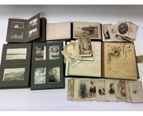 A collection of Victorian portrait cards together with a 4 Photo albums and a visitors book.