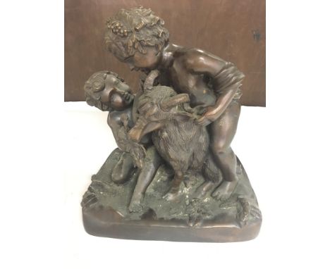 Bronze Figures Feeding A Goat. Measuring 34CM in height.