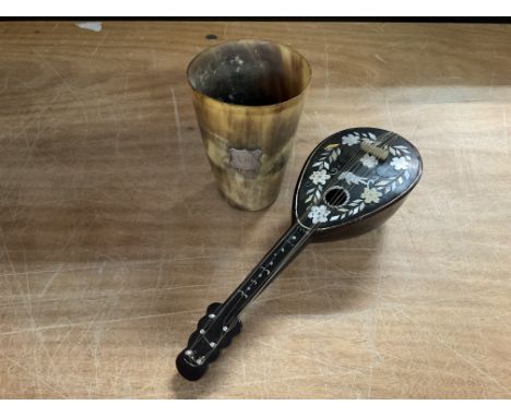 Antique horn drinking flask with silver double ended on side for engraving and a small horn mandolin inlaid with Mother Oâ€™ 