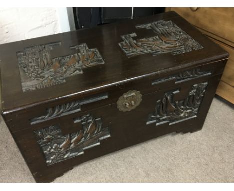 A carved Camphor wood trunk 91x46cm