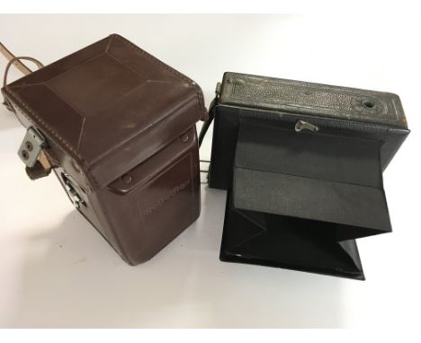 A Rolleitflex TLR Camera and a Vintage Agra Camera. (2)