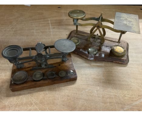 Two sets of Victorian post office scales with weights
