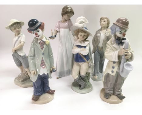 Two Lladro figures of clowns and four Nao figures of children (6).