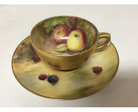 A Royal Worcester hand painted small cup and saucer by F Harper and Powell signed the gilded cup painted with blackberries an