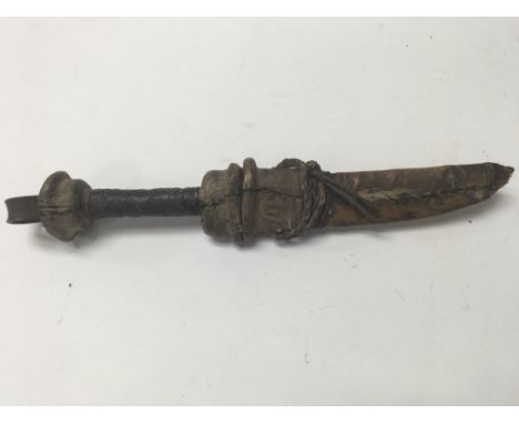 A African dagger with steal blade .