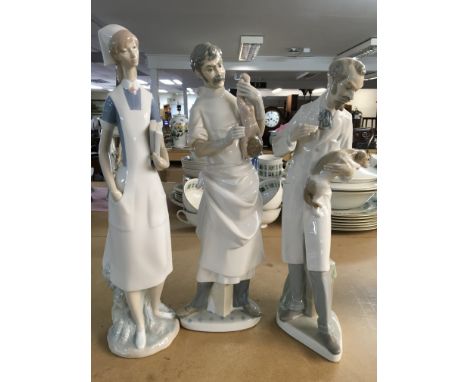 Three Lladro figures including a vet together with a Nao doctor.