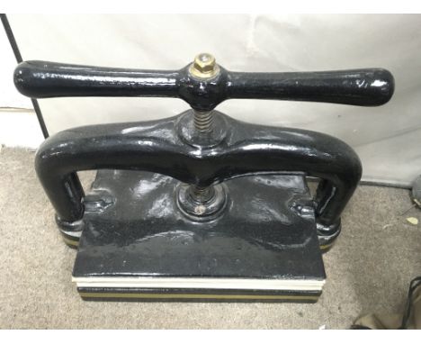 Vintage cast iron book press. 50cm wide by 40cm high. Extremely heavy.