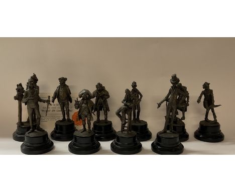 A collection of 10 patinated bronze figurines c.1970s depicting the characters of Charles Dickens to include Scrooge, Mr. Pic