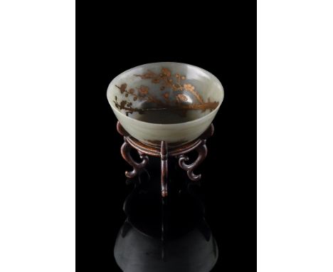 A Chinese celadon jade gilt-decorated bowl, Qing dynasty, 18th or 19th century, painted to the interior and exterior in gilt 