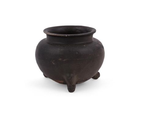 A rare Chinese brown-glazed tripod censer, Tang Dynasty, 8th-9th century, the globular body set on three cabriole legs, the u