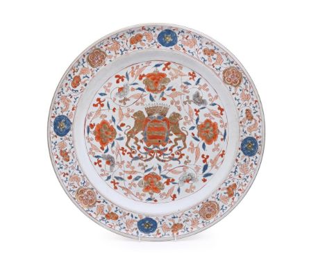 A large Chinese Armorial dish, the porcelain Kangxi, decorated with blue enamel foliage and flower heads and also with pale w