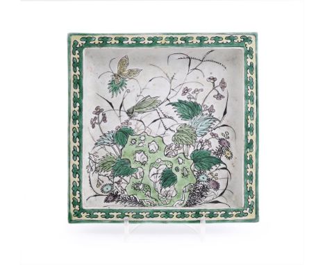 A rare Chinese Famille Verte square dish, early Kangxi, circa 1680, the shallow sides rising to flat rims and resting on low,