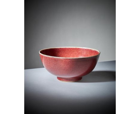A Chinese Lanyao red monochrome bowl, Qing Dynasty, Kangxi, with finely veined glaze, the foot interior glazed in turquoise, 