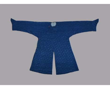 A Chinese man's blue silk damask scholars robe, Late 19th century, woven with scholars objects of accomplishment, with a grey