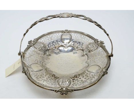 A Victorian silver bread basket, by Hawkesworth, Eyre &amp; Co, Sheffield, 1858, pierced, repousse-moulded and chased with fo