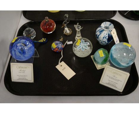 A selection of decorative glassware, including: three Caithness glass paperweights, with certificates; a Murano glass paperwe