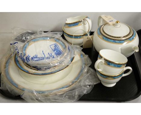 A Wedgwood "Curzon" part tea and dinner service comprising teapot, two tea trios, cream, sugar, two dinner plates and one bow