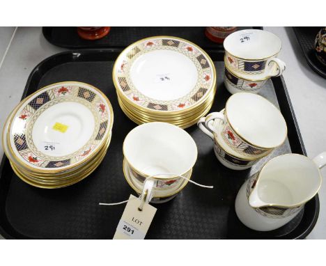 A Royal Crown Derby 'Derby Border' tea service, comprising: six tea trios, cream jug and additional side plates.