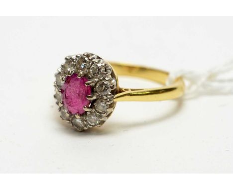 A ruby and diamond dress ring, on an 18ct gold shank, size O, 3.6g gross. 