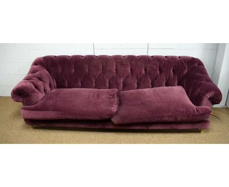 A Chesterfield-style 'Loaf sofa', the buttoned back, arms and loose seat cushions upholstered in purple coloured dralon, appr