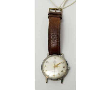 A 1960s stainless-steel cased Tudor "Royal" wristwatch, with manual-wind movement, champagne face, and Arabic numerals, with 
