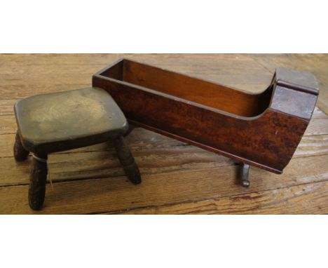 A 19th century walnut doll's rocker and a 19th century hardwood four legged stool