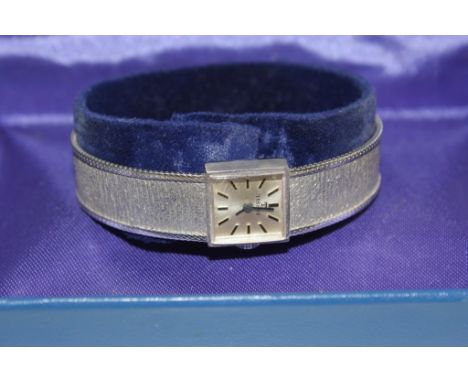 A lady's 9 carat white gold Tissot wrist watch in original box 21.3 grams