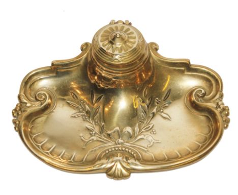 An attractive small brass inkwell with original ceramic ink pot, decorated with swags and ribbons, circa 1920