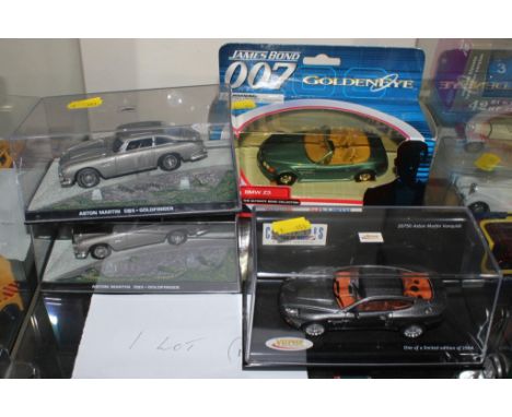 Corgi -James Bond, Goldeneye BMW Z3 boxed and mint, together with two Aston Martin cased DBS and an Aston Martin Vanquish, ca