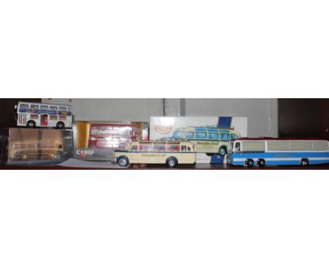 Five models of bus coaches, including Dinky, Corgi and Matchbox