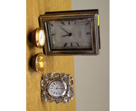 A Carrs of Sheffield silver small bedside table clock, 1989, together with an enamelled round ball travelling clock by Rolet 