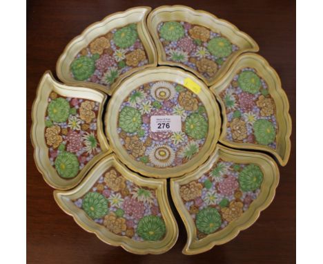 A Japanese / Oriental hors d'oeuvres ceramic dish set with profusely decorated enamelled chrysanthemum flowers