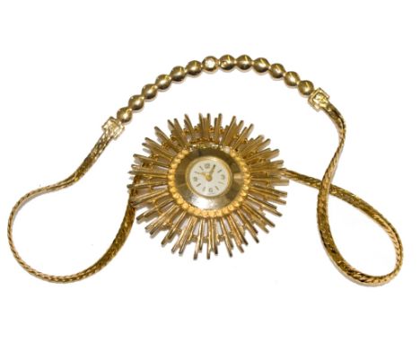 A lady's costume sunburst watch and a Christian Dior necklace (2)
