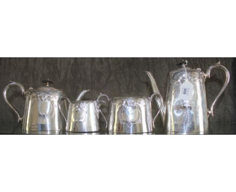 A Victorian-style silver plated tea service, to include coffee pot, tea pot, two handled sugar bowl and milk jug with floral 