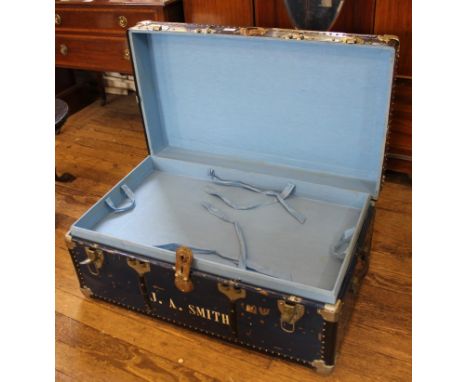 An early 20th century metal bound travelling or storage trunk with lined and fitted interior, 90H x 50cmW