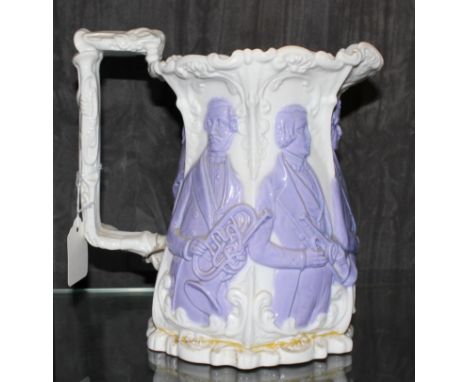 A 19th century ceramic jug depicting the 'Distin Family, the Sax Horn Performers' in slip ware, 23cm high, as found 
